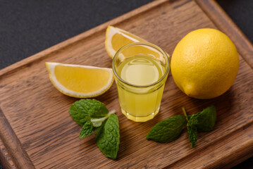 Alcoholic drink yellow limoncello in a small glass