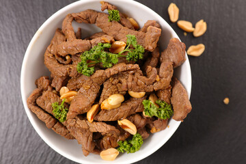 Thai beef stir-fry with peanut and herbs