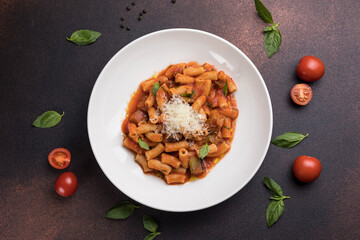 Rigatoni pasta with tomato sauce and parmesan cheese
