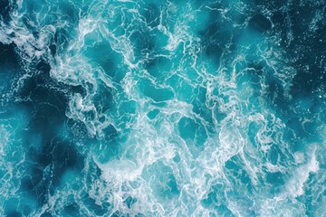 Obraz premium Turquoise ocean waves in aerial view.