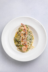 Pasta with shrimps, garlic and parmesan cheese