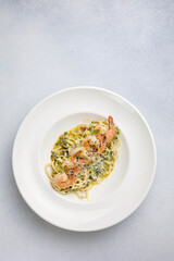 Pasta with shrimps, garlic and parmesan cheese