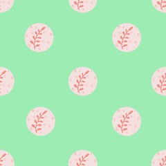 pattern of pink branches on a green background