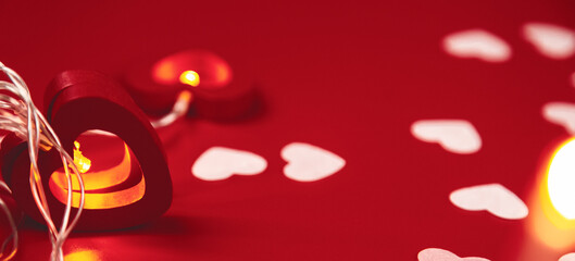 Valentine's day composition. Heart on a red background. Copy space