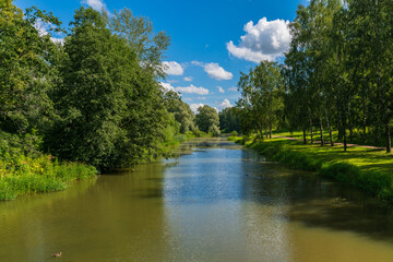 View from the humpback bridge to the Slavyanka river in Pavlovsk