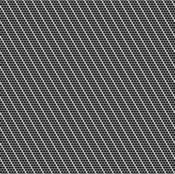 Densely spaced dots form oblique diagonal rows. The result is a screentone or a pattern of dots.