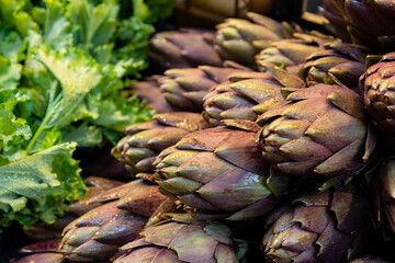 beautiful fresh artichokes for sale at the market