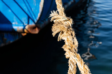 rope of a ferry moored to the island of Ponza, Italy