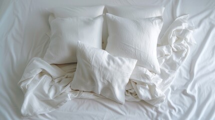 Obraz premium a pile of white pillows sitting comforter bedspread.
