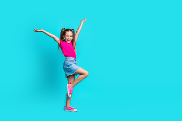 Fototapeta na wymiar Full size profile photo of overjoyed lovely girl raise hands empty space ad isolated on teal emerald color background
