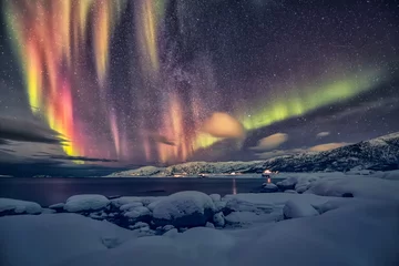 Poster An aurora, also commonly known as the northern lights or southern lights, is a natural light display in Earth's sky, predominantly seen in high-latitude regions. Auroras display dynamic patterns of br © janstria