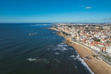 Serenity Meets Skylines: A Captivating Aerial Panorama of Foz Do Douro Beach Embraced by Porto City