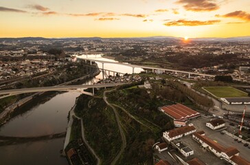 Bridging the River: A Majestic Aerial Perspective Captures the Graceful Dom Luís I Bridge Connecting Porto and Vila Nova De Gaia.