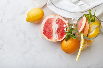 Summer mocktail with citrus fruits. Vitaminized detox water. Low alcohol, zero proof drinks. Top...