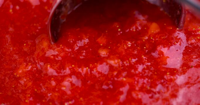 strawberry puree of fresh red strawberries, homemade organic strawberries while cooking berry puree and jam