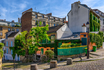Old street of old Montmartre in Paris, France. Cozy cityscape of Paris. Architecture and landmarks...