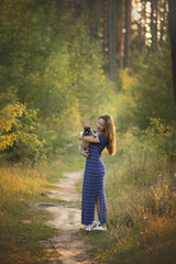 Woman with french bulldog