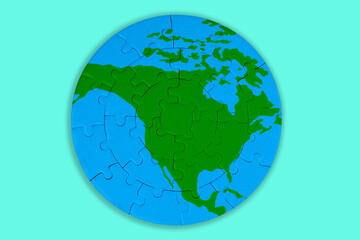 North America Puzzle: Green Continent with Blue Oceans
