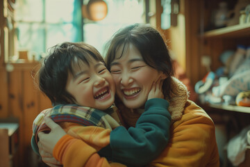 mom and her child are laughing and hugging each other