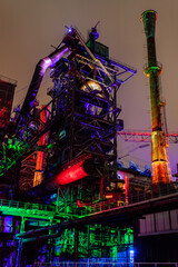 Landschaftspark Duisburg-Nord by night with all coloured buildings.