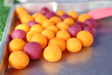 Thai snack: Fried Mung Bean Stuffed Balls. Thai Fried Sweet Potato Balls.