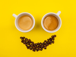 cup of coffee with smile shaped coffee beans