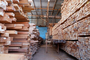 pile of wood for house building materials. to illustrate the high price of wood