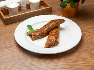 Rye pancakes with apple and cinnamon. Dessert.