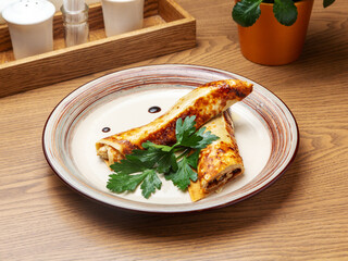 Pancakes with julienne in a plate. Breakfast.