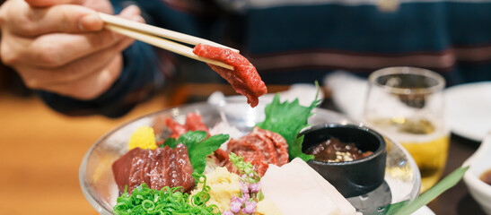 horse meat pieces sashimi or Japanese Basashi. Baniku includes lean meat, superb marbling, mane and...