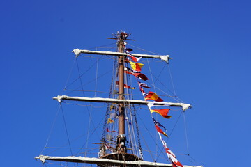 The front mast, sails and decoration flags of the BAP UNION, a sailing, training ship of the...