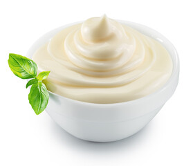Homemade mayonnaise in a white bowl on white background. File contains clipping path.
