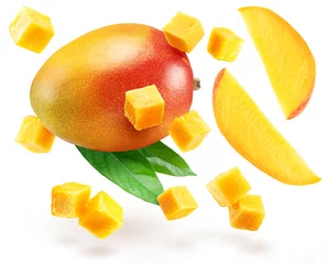 Fototapeten Mango fruits and mango slices levitating in air on white background. © volff