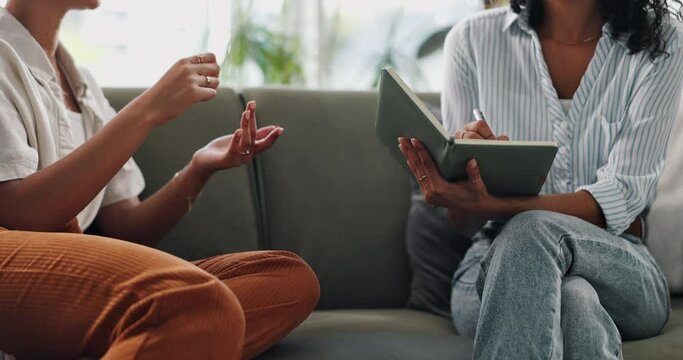 Mental health, women and writing on sofa for therapy, counseling or life coaching session in morning. Professional therapist, female patient or client on couch while talking and making notes