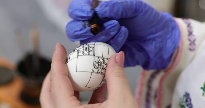 4k movie of traditional hand made painted Easter eggs presented at a fair of popular traditions. This eggs are painted with traditional motifs from Bukovina.