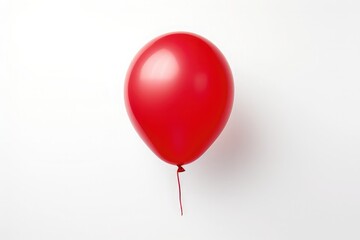 A red balloon isolated against a white background