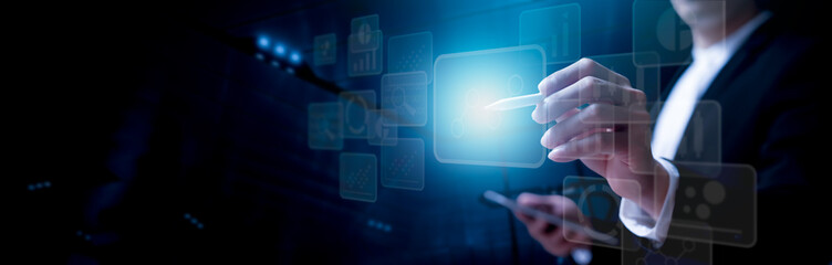 businessman on document planning the business plans and analyse  profitability of working companies with digital augmented virtual graphics for project manager working on laptop and update information