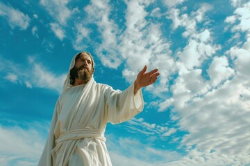 Jesus Christ hand against the sky
