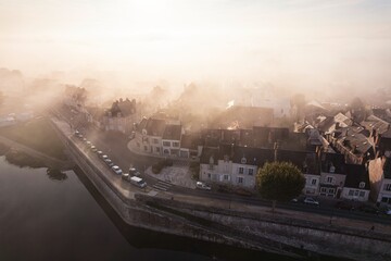 Rhapsody of the River: A Mesmerizing Aerial Symphony Unveiling Blois Serpentine Watercourse Amid Urban Tapestry