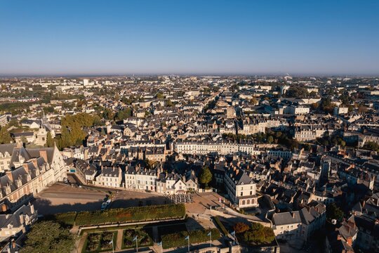 Urban Tapestry: A Mesmerizing Aerial Symphony of Blois Illuminated by a Myriad of Majestic Towers