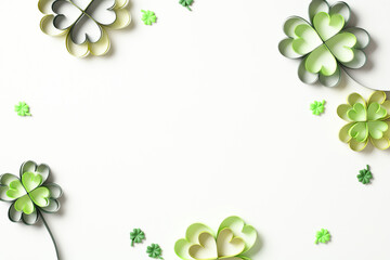 Frame of St Patrick's Day shamrock clover on white background. Flat lay, top view, copy space. - obrazy, fototapety, plakaty