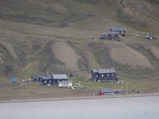 Spitsbergen Huts by the Fjord