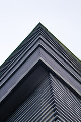 Fototapeta na wymiar modern building details geometric and abstract architectural concepts with low angle.