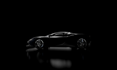 side view of black supercar on dark background. nobody.