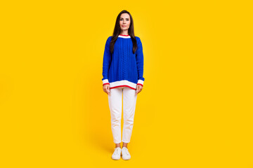 Full body length photo of young woman brunette hair latin in blue knitted sweater with white pants...