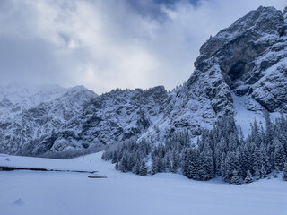 Fototapeta na wymiar Snow-covered winter landscape with mountains in Pertisau at Lake Achensee