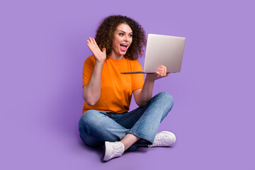 Photo of charming positive woman dressed trendy clothes speaking chatting video webcam isolated on purple color background