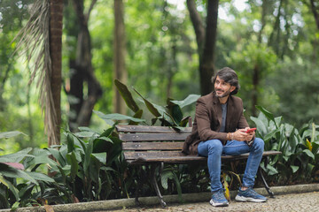 Fototapeta premium View of a young man with smartphone