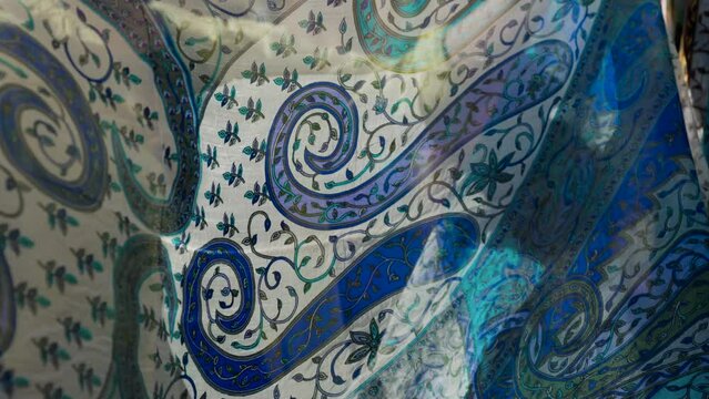 Ethnic cloth and scarf at market in Uzbekistan