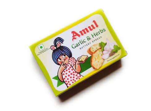 Guwahati, Assam, India - January 26, 2024 : Amul Garlic and Herbs Buttery Spread offers rich Garlic taste with Oregano herbs blended well in Classic Amul Butter gives it a unmatched taste and flavour.
